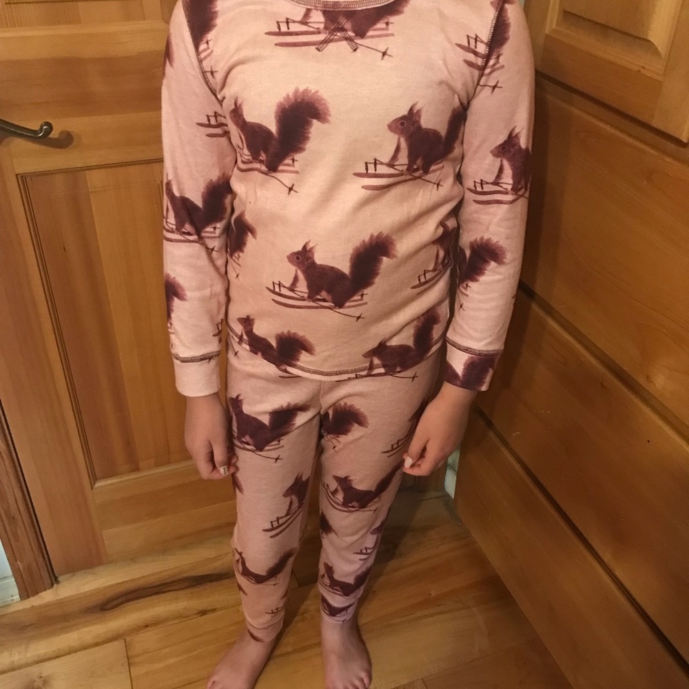 Justice two-piece pajamas, size 8, with a super cute skiing squirrel design